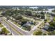 Aerial view of a residential neighborhood with houses and roads at 2259 Howland Blvd, Deltona, FL 32738