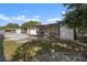 Large backyard with patio and screened porch at 2259 Howland Blvd, Deltona, FL 32738