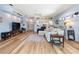 Bright living room with hardwood floors and a view of entryway at 21908 Royal St Georges Ln, Leesburg, FL 34748