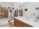 Bathroom with double vanity and Mickey Mouse shower curtain at 11562 Amidship Ln # 106, Windermere, FL 34786