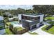 Modern home with pool and landscaped yard, offering an open floor plan and sleek design at 2522 Lafayette Ave, Winter Park, FL 32789