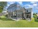 Two-story house with pool and screened enclosure at 15543 Pebble Ridge St, Winter Garden, FL 34787