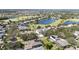 Community view, featuring golf course and lake at 15543 Pebble Ridge St, Winter Garden, FL 34787