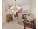 Spacious dining room with large chandelier and hardwood floors at 15543 Pebble Ridge St, Winter Garden, FL 34787