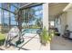 Relaxing pool area with screened enclosure at 15543 Pebble Ridge St, Winter Garden, FL 34787