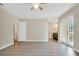 Spacious Primary bedroom with hardwood floors and access to the patio at 500 Teacup Springs Ct, Winter Garden, FL 34787