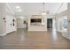 Open concept living room with kitchen view at 500 Teacup Springs Ct, Winter Garden, FL 34787