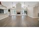 Bright living room with hardwood floors and fireplace at 500 Teacup Springs Ct, Winter Garden, FL 34787