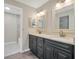 Elegant bathroom with double vanity and modern fixtures at 500 Teacup Springs Ct, Winter Garden, FL 34787
