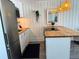 Small galley-style kitchen with light wood countertops at 10301 Us Highway 27 # 85, Clermont, FL 34711