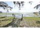 Private lake access with wooden steps at 10301 Us Highway 27 # 85, Clermont, FL 34711