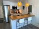 Modern kitchen with breakfast bar and stainless steel appliances at 10301 Us Highway 27 # 85, Clermont, FL 34711