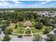 Aerial view of community pool with surrounding green space at 1091 Indigo Dr # 201, Celebration, FL 34747