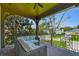 Relaxing porch with wicker furniture and wrought iron railing at 2228 Azalea Pl, Winter Park, FL 32789