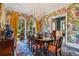 Spacious dining room with scenic views and unique decor at 2228 Azalea Pl, Winter Park, FL 32789