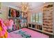 Bright walk-in closet with shoe shelves and clothing racks at 2228 Azalea Pl, Winter Park, FL 32789