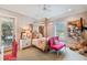 Charming bedroom with a gold canopy bed and pink accents at 2228 Azalea Pl, Winter Park, FL 32789