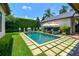 Enjoy the refreshing pool with comfortable lounge chairs at 2228 Azalea Pl, Winter Park, FL 32789