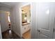 Guest bathroom with a single sink and toilet at 1545 Blue Sky Blvd, Haines City, FL 33844