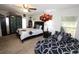 Spacious Primary bedroom with a king-size bed and twin bed at 1545 Blue Sky Blvd, Haines City, FL 33844