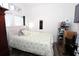 Cozy bedroom with a double bed and ample closet space at 1545 Blue Sky Blvd, Haines City, FL 33844
