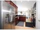 Modern kitchen with stainless steel appliances and ample cabinet space at 1545 Blue Sky Blvd, Haines City, FL 33844