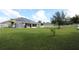 House backyard with solar panels and a shed at 1545 Blue Sky Blvd, Haines City, FL 33844
