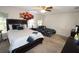 Spacious bedroom with a king-size bed and additional sleeping space at 1545 Blue Sky Blvd, Haines City, FL 33844