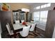 Elegant dining room with a large table and built-in hutch at 1545 Blue Sky Blvd, Haines City, FL 33844