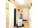 Laundry room with washer, dryer, and storage at 1545 Blue Sky Blvd, Haines City, FL 33844