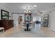 Bright dining room with a round table and chairs, and a sliding barn door at 632 Country Club Dr, Winter Park, FL 32789
