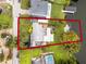 Aerial view showcasing home's location, yard, and proximity to water at 632 Country Club Dr, Winter Park, FL 32789