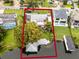 Aerial view of a waterfront home with a large backyard and boat dock at 632 Country Club Dr, Winter Park, FL 32789