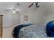 Bright bedroom with a ceiling fan and large closet at 632 Country Club Dr, Winter Park, FL 32789