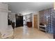 Relaxing living area with fireplace, built-in shelving, and hardwood floors at 632 Country Club Dr, Winter Park, FL 32789