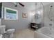 Clean bathroom with a walk-in shower and modern vanity at 632 Country Club Dr, Winter Park, FL 32789