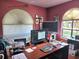 Home office with a large desk and two monitors at 450 Longmeadow Ln, Longwood, FL 32779