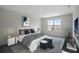 Main bedroom with a king-size bed and an ensuite bathroom at 2526 Sage Valley Way, Winter Haven, FL 33884