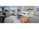 Spacious living room with comfy seating and large windows at 2526 Sage Valley Way, Winter Haven, FL 33884
