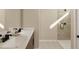 Bathroom boasts double sinks and a walk-in shower at 163 Aulin Ave, Oviedo, FL 32765