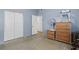 Simple bedroom with double doors and wood flooring at 621 Oaklando Dr, Altamonte Springs, FL 32714