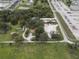 Aerial view showing property with surrounding trees and road at 621 Oaklando Dr, Altamonte Springs, FL 32714