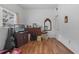 Bedroom with wood floors, dresser, and a TV at 621 Oaklando Dr, Altamonte Springs, FL 32714