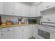 Bright eat-in kitchen with ample cabinetry and wood countertops at 621 Oaklando Dr, Altamonte Springs, FL 32714