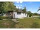 Another view of home's side yard with grassy area at 621 Oaklando Dr, Altamonte Springs, FL 32714
