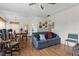 Living room with hardwood floors, open floor plan, and couch at 621 Oaklando Dr, Altamonte Springs, FL 32714