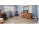 Bedroom with wood dresser, chair, and window with blinds at 621 Oaklando Dr, Altamonte Springs, FL 32714