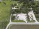 Aerial view showing property with large yard and outbuildings at 621 Oaklando Dr, Altamonte Springs, FL 32714