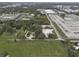 Aerial view showing home and surrounding land with nearby buildings at 621 Oaklando Dr, Altamonte Springs, FL 32714