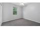 Spacious bedroom with neutral walls and carpeted floors at 226 W Tarrington Dr, Deland, FL 32724